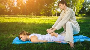 massage with yoga exercises